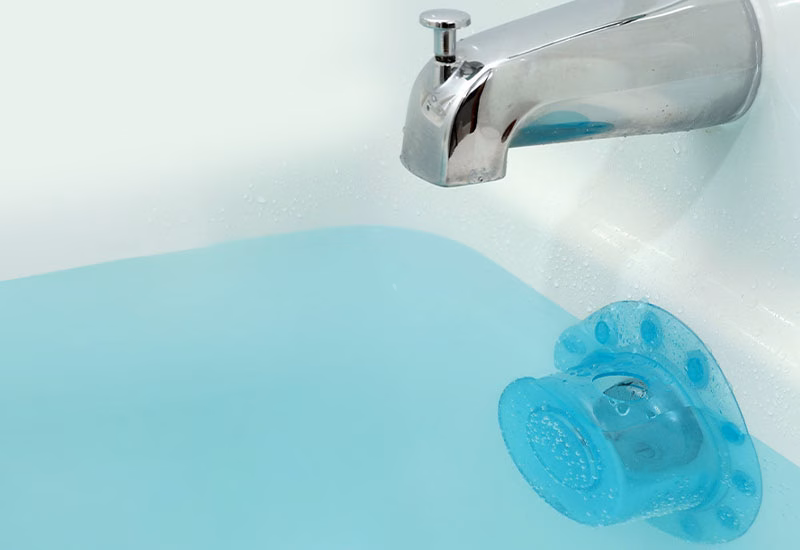 Bottomless bath overflow drain cover raises the water levels in a full bathtub.