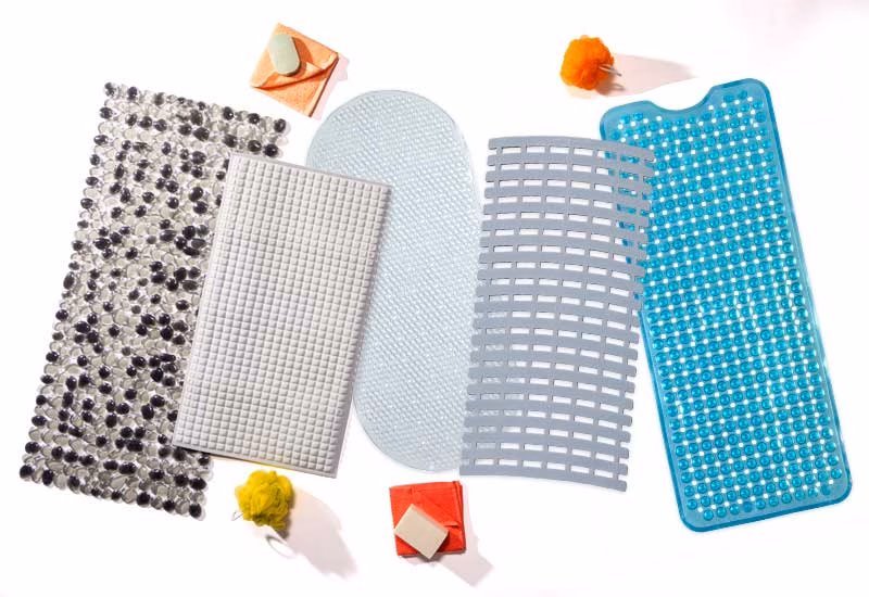 An assortment of slipx solutions non slip bath mats.