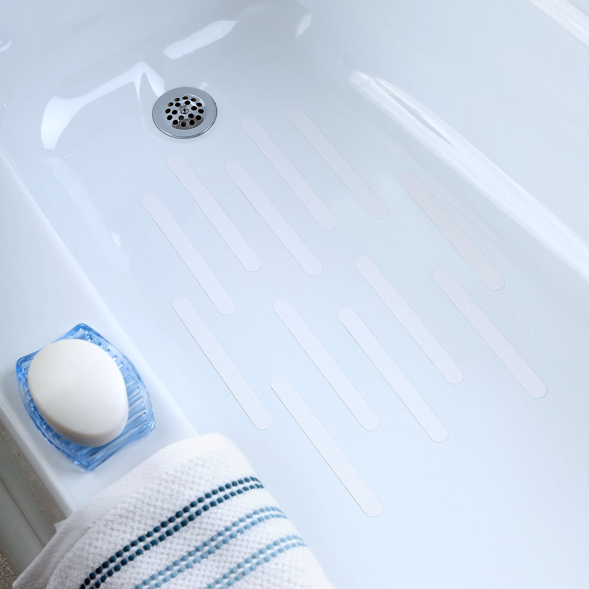 Adhesive safety stickers shown in a smooth bathtub